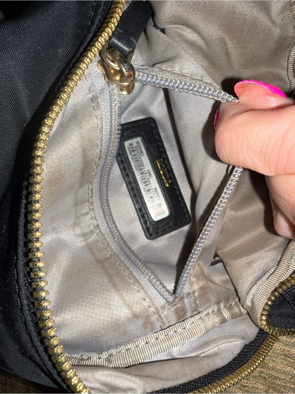 Tumi Black Sling Belt Bag with Gold Hardware